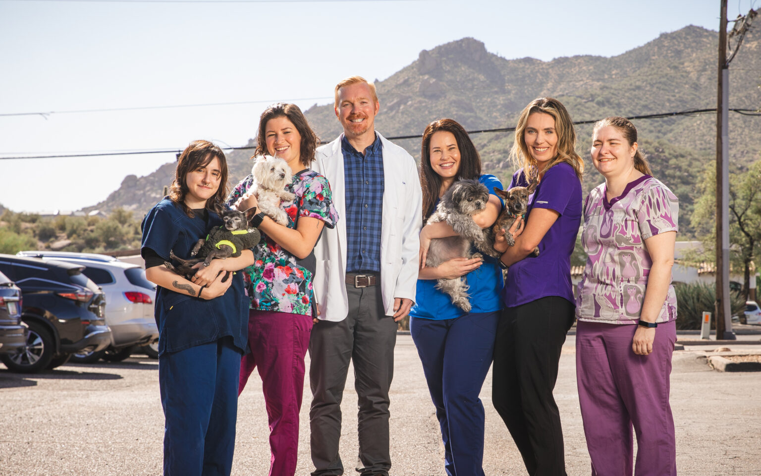 Desert Forest Animal Hospital veterinary team with dogs in Cave Creek, Arizona