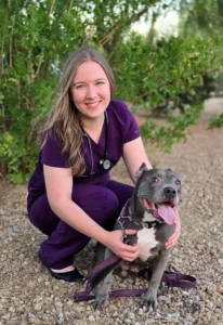Dr. Quinn Bauer, DVM with a canine patient at Desert Forest Animal Hospital
